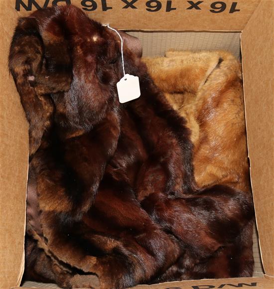 A Maison Sistovaris mink fur stole with pendant tails and a similar dark brown stole